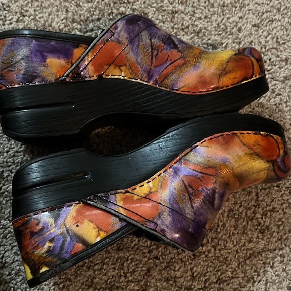 Two pairs of Dansko shoes one pair of Mary Jane the other are multi colored. - Picture 6 of 8